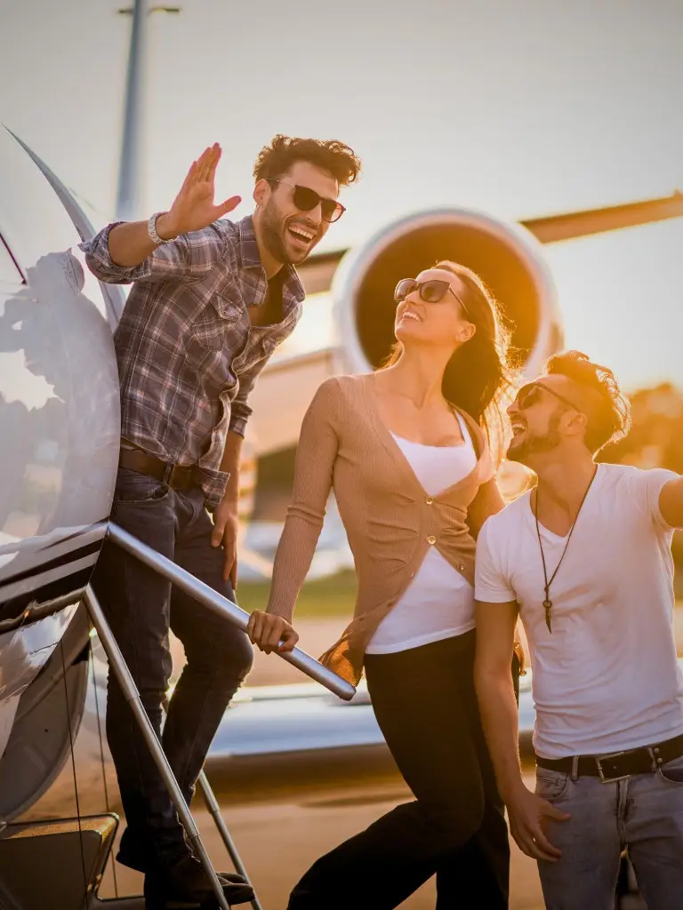 People getting off a plane