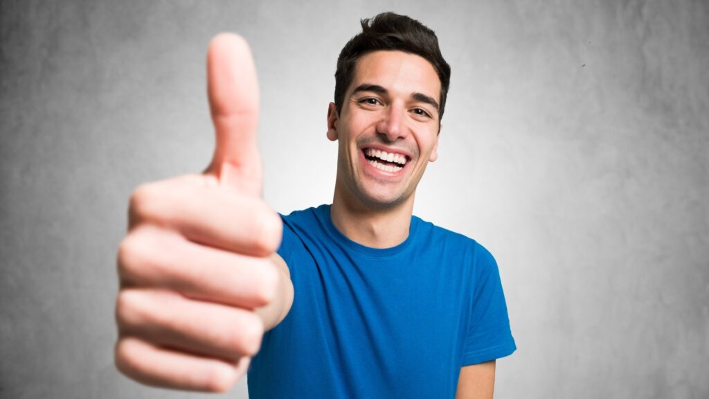 A person smiling after having ketamine therapy sessions to help their mental well-being