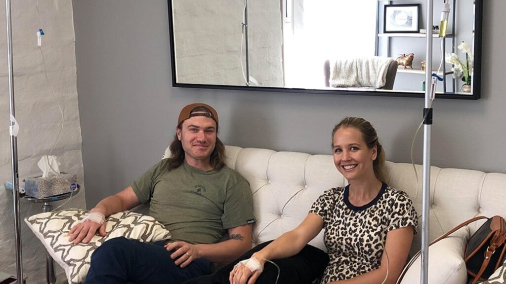 A happy couple enjoying an iv drip therapy session that will make them feel amazing